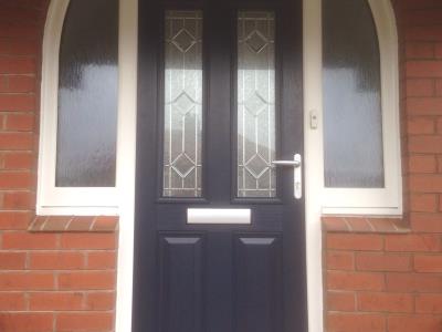 Composite door with mushroom shaped UPVC outer frame, featuring art deco leaded bevel design for South Shore home, Blackpool.