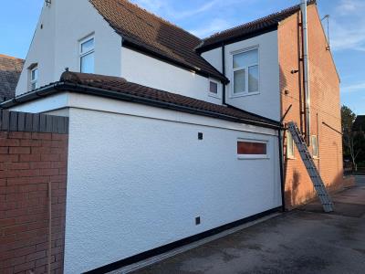 Rendering to a tyrolean finish for a Thornton-Cleveleys home, protected further with a polar white wall coating.